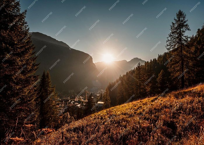 Pordoi Pass Premium Photo | Majestic landscape of alpine red autumn canazei ... photo