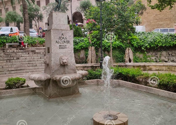 Placa de la Reina Monument for Joan Alcover and Fountain in Plaza De La Reina, Palma ... photo