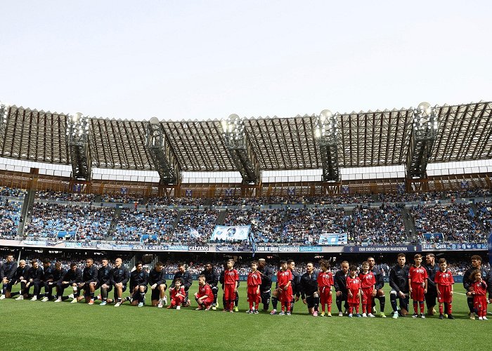 Diego Armando Maradona Stadium Napoli players take a knee in public show of support after alleged ... photo
