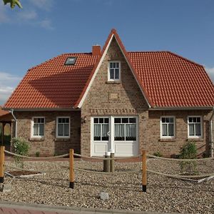 Wellness Ferienhaus Mit Sauna Und Kaminofen Sowie Carport Und Terrasse Krummhörn Exterior photo