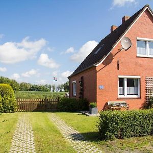 Ferienhaus Mit Sonnenterrasse, Parkplatz Und Garage Sowie Einem Gemutlichen Kamin Krummhörn Exterior photo